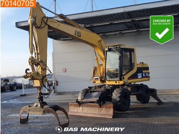 Bager na kotačima Caterpillar M312 OUTRIGGERS AND BLADE - GRAPPLE