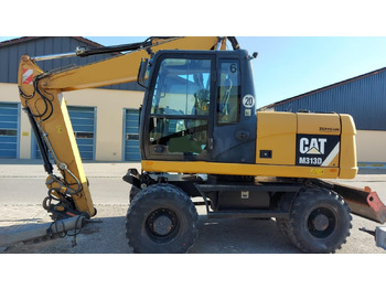 Bager na kotačima Caterpillar M313D VAH: slika Bager na kotačima Caterpillar M313D VAH