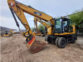 Bager na kotačima CATERPILLAR M318F