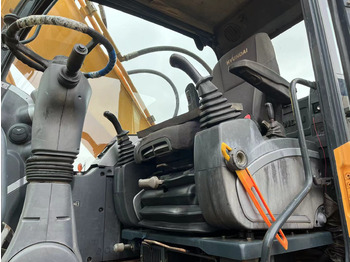 Bager na kotačima HYUNDAI 210W-9: slika Bager na kotačima HYUNDAI 210W-9 Bager na kotačima HYUNDAI 210W-9: slika Bager na kotačima HYUNDAI 210W-9