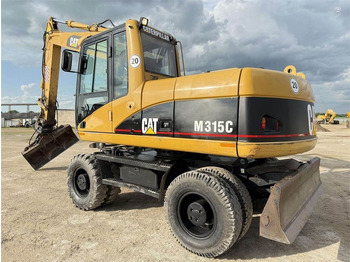 Bager na kotačima CATERPILLAR M315C