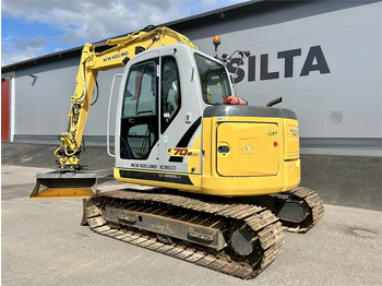 Mini bager New Holland E 70BSR 2D MITTALAITTEET: slika Mini bager New Holland E 70BSR 2D MITTALAITTEET