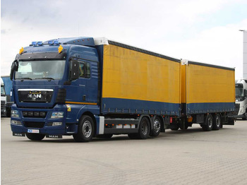 Kamion s ceradom MAN TGS 26.440
