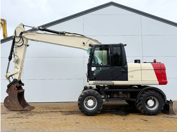 Bager na kotačima CATERPILLAR M316D