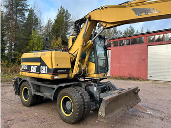 Bager na kotačima Caterpillar M312 Engcon EC20 tiltrotator: slika Bager na kotačima Caterpillar M312 Engcon EC20 tiltrotator Bager na kotačima Caterpillar M312 Engcon EC20 tiltrotator: slika Bager na kotačima Caterpillar M312 Engcon EC20 tiltrotator