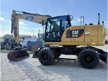 Bager na kotačima CATERPILLAR M318F