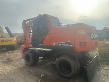 Bager na kotačima Doosan DX150W-9C: slika Bager na kotačima Doosan DX150W-9C Bager na kotačima Doosan DX150W-9C: slika Bager na kotačima Doosan DX150W-9C