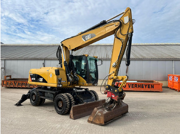 Bager na kotačima CATERPILLAR M318D