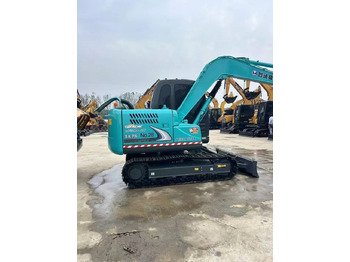 Bager gusjeničar Kobelco SK 75: slika Bager gusjeničar Kobelco SK 75 Bager gusjeničar Kobelco SK 75: slika Bager gusjeničar Kobelco SK 75