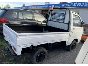 Vozilo za čišćenje snijega Piaggio Piaggio Porter 4X4 Skrzynia odśnieżarka Pług 2011: slika Vozilo za čišćenje snijega Piaggio Piaggio Porter 4X4 Skrzynia odśnieżarka Pług 2011