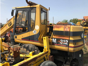 Bager na kotačima CATERPILLAR M312