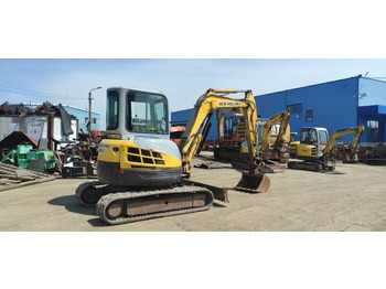 Zakup New Holland E 50.2 C  New Holland E 50.2 C: slika Zakup New Holland E 50.2 C  New Holland E 50.2 C