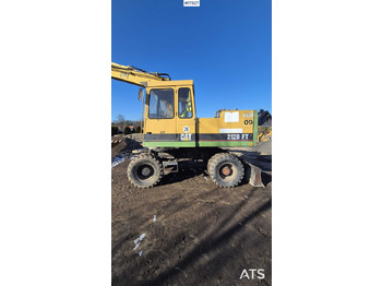 Bager na kotačima CATERPILLAR