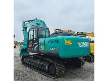 Bager gusjeničar KOBELCO SK210: slika Bager gusjeničar KOBELCO SK210
