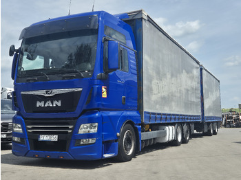 Kamion s ceradom MAN TGX 24.500