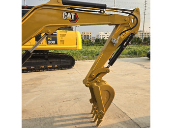 Mini bager CATERPILLAR 303.5E2: slika Mini bager CATERPILLAR 303.5E2