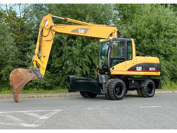 Bager na kotačima CATERPILLAR M315C