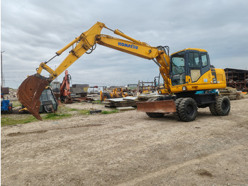 Bager na kotačima KOMATSU PW140