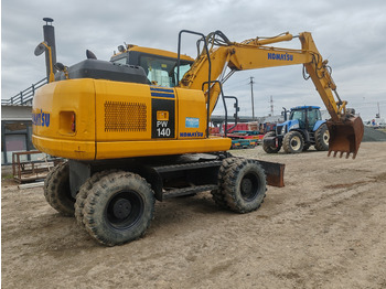 Bager na kotačima Komatsu PW140-7: slika Bager na kotačima Komatsu PW140-7