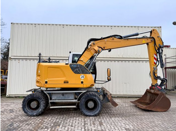 Bager na kotačima Liebherr A914 Compact / 2017 BJ / 9.979 H / OilQuick: slika Bager na kotačima Liebherr A914 Compact / 2017 BJ / 9.979 H / OilQuick