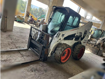 Mini utovarivač BOBCAT S750: slika Mini utovarivač BOBCAT S750