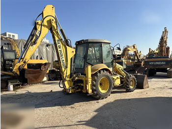 Rovokopač-utovarivač NEW HOLLAND