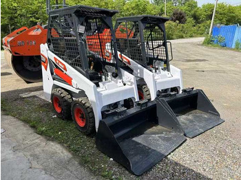 Mini utovarivač Used Bobcat S70  Skid Teer in Stock Good Condition bobcat S70 S160 185 300 330 Skid Steer  for Sale: slika Mini utovarivač Used Bobcat S70  Skid Teer in Stock Good Condition bobcat S70 S160 185 300 330 Skid Steer  for Sale