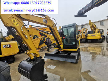 Mini bager Caterpillar 306E2: slika Mini bager Caterpillar 306E2 Mini bager Caterpillar 306E2: slika Mini bager Caterpillar 306E2