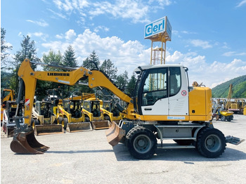 Bager na kotačima LIEBHERR A 910