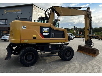 Bager na kotačima CAT M 318 F: slika Bager na kotačima CAT M 318 F Bager na kotačima CAT M 318 F: slika Bager na kotačima CAT M 318 F