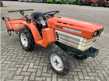 Mali traktor Kubota B1200: slika Mali traktor Kubota B1200 Mali traktor Kubota B1200: slika Mali traktor Kubota B1200