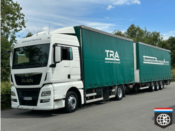 Kamion s ceradom MAN TGX 18.440