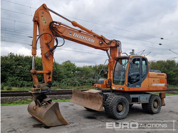 Bager na kotačima DOOSAN DX210