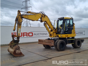 Bager na kotačima KOMATSU PW118