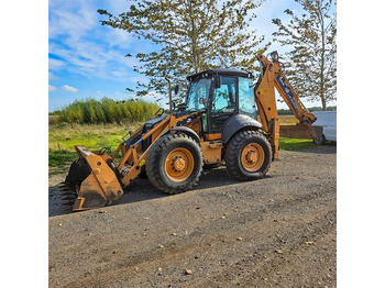 Rovokopač-utovarivač CASE 695