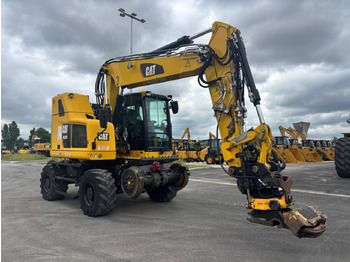 Bager na kotačima CATERPILLAR M323F