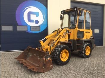 Utovarivač na kotačima Hanomag 10E Shovel/ Wiellader Perkins motor + 4-1 Laadschop + Palletvorken: slika Utovarivač na kotačima Hanomag 10E Shovel/ Wiellader Perkins motor + 4-1 Laadschop + Palletvorken