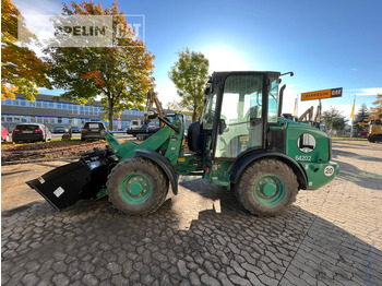 Utovarivač na kotačima CATERPILLAR 906M