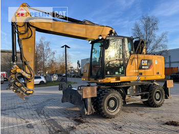 Stroj za rukovanje otpadom CATERPILLAR MH3024