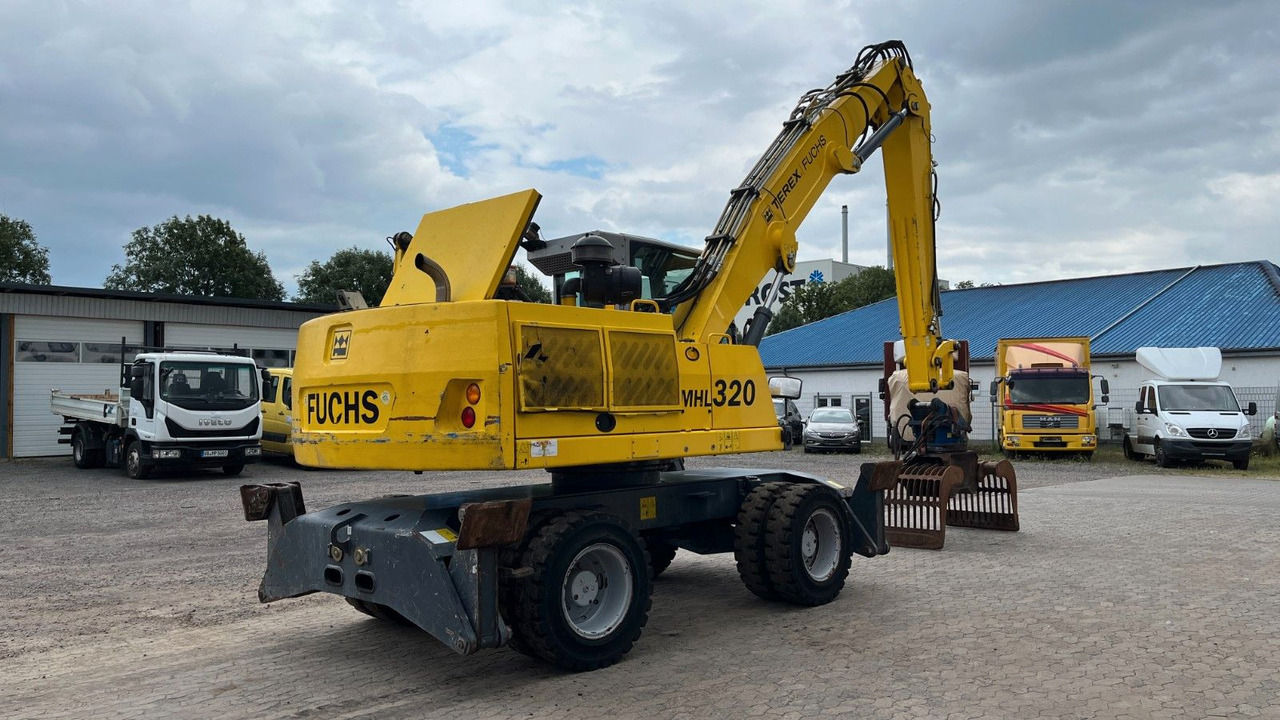 Fuchs TeRex MHL 320 D Umschlagbagger Greifer Pratzen - Stroj za rukovanje otpadom: slika Fuchs TeRex MHL 320 D Umschlagbagger Greifer Pratzen - Stroj za rukovanje otpadom Fuchs TeRex MHL 320 D Umschlagbagger Greifer Pratzen - Stroj za rukovanje otpadom: slika Fuchs TeRex MHL 320 D Umschlagbagger Greifer Pratzen - Stroj za rukovanje otpadom