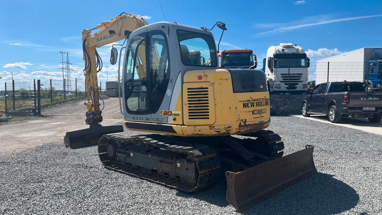 Kobelco New Holland E 80 MSR Minibagger SW 8300 Kg - Mini bager: slika Kobelco New Holland E 80 MSR Minibagger SW 8300 Kg - Mini bager Kobelco New Holland E 80 MSR Minibagger SW 8300 Kg - Mini bager: slika Kobelco New Holland E 80 MSR Minibagger SW 8300 Kg - Mini bager