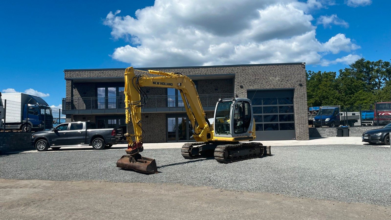 Kobelco New Holland E 80 MSR Minibagger SW 8300 Kg - Mini bager: slika Kobelco New Holland E 80 MSR Minibagger SW 8300 Kg - Mini bager Kobelco New Holland E 80 MSR Minibagger SW 8300 Kg - Mini bager: slika Kobelco New Holland E 80 MSR Minibagger SW 8300 Kg - Mini bager