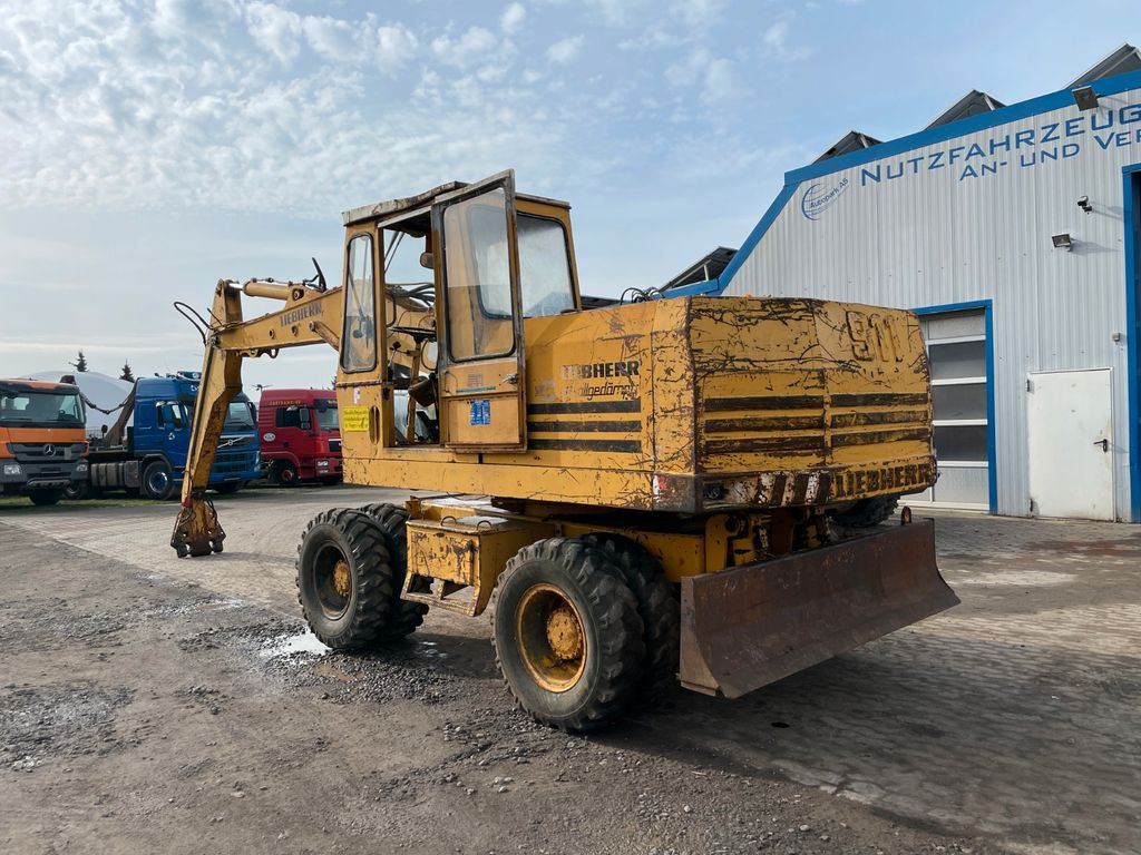 Liebherr A 911 C A911C Umschlagbagger Magnet-Generator - Bager na kotačima: slika Liebherr A 911 C A911C Umschlagbagger Magnet-Generator - Bager na kotačima Liebherr A 911 C A911C Umschlagbagger Magnet-Generator - Bager na kotačima: slika Liebherr A 911 C A911C Umschlagbagger Magnet-Generator - Bager na kotačima