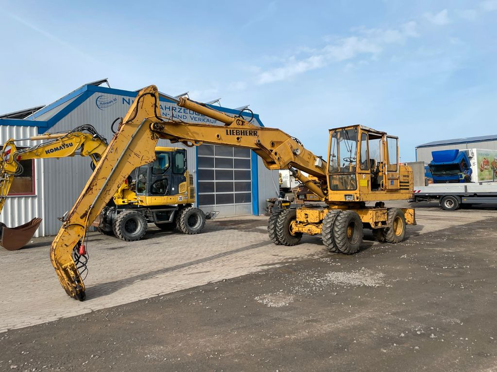 Liebherr A 911 C A911C Umschlagbagger Magnet-Generator - Bager na kotačima: slika Liebherr A 911 C A911C Umschlagbagger Magnet-Generator - Bager na kotačima Liebherr A 911 C A911C Umschlagbagger Magnet-Generator - Bager na kotačima: slika Liebherr A 911 C A911C Umschlagbagger Magnet-Generator - Bager na kotačima