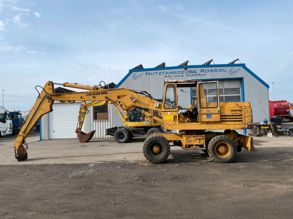 Liebherr A 911 C A911C Umschlagbagger Magnet-Generator - Bager na kotačima: slika Liebherr A 911 C A911C Umschlagbagger Magnet-Generator - Bager na kotačima Liebherr A 911 C A911C Umschlagbagger Magnet-Generator - Bager na kotačima: slika Liebherr A 911 C A911C Umschlagbagger Magnet-Generator - Bager na kotačima