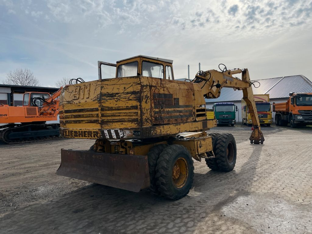 Liebherr A 911 C A911C Umschlagbagger Magnet-Generator - Bager na kotačima: slika Liebherr A 911 C A911C Umschlagbagger Magnet-Generator - Bager na kotačima Liebherr A 911 C A911C Umschlagbagger Magnet-Generator - Bager na kotačima: slika Liebherr A 911 C A911C Umschlagbagger Magnet-Generator - Bager na kotačima