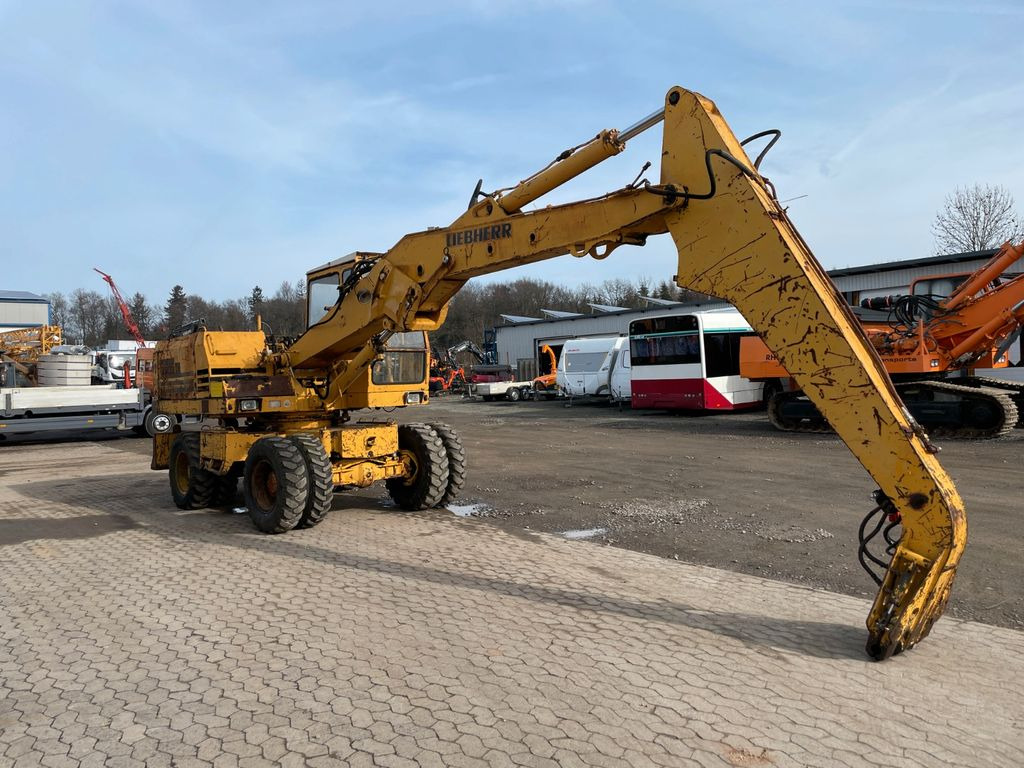Liebherr A 911 C A911C Umschlagbagger Magnet-Generator - Bager na kotačima: slika Liebherr A 911 C A911C Umschlagbagger Magnet-Generator - Bager na kotačima Liebherr A 911 C A911C Umschlagbagger Magnet-Generator - Bager na kotačima: slika Liebherr A 911 C A911C Umschlagbagger Magnet-Generator - Bager na kotačima