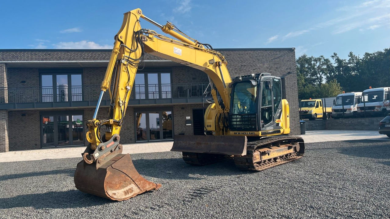 New Holland E140CSR Kettenbagger 16.000 Kg - Bager gusjeničar: slika New Holland E140CSR Kettenbagger 16.000 Kg - Bager gusjeničar New Holland E140CSR Kettenbagger 16.000 Kg - Bager gusjeničar: slika New Holland E140CSR Kettenbagger 16.000 Kg - Bager gusjeničar