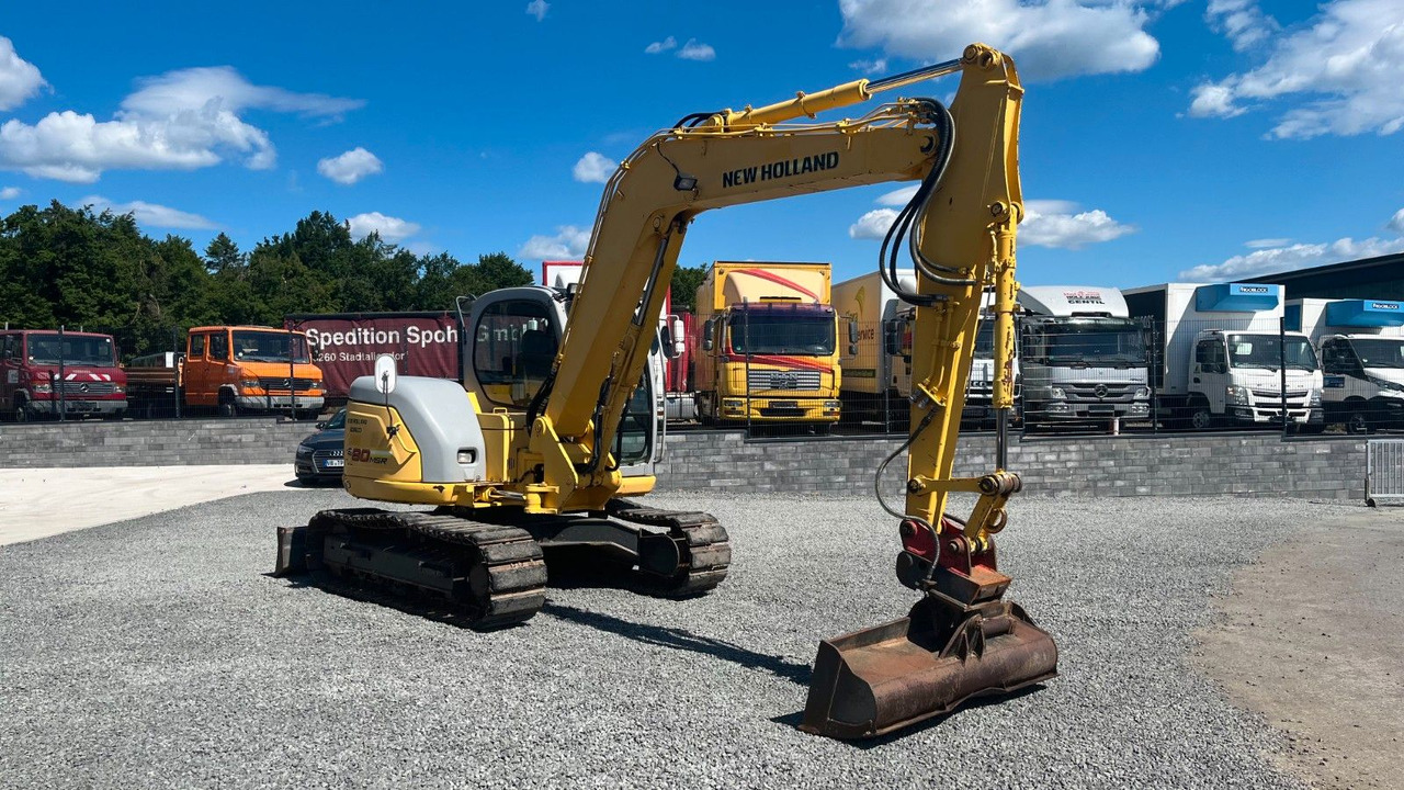 New Holland Kobelco E 80 MSR Minibagger SW 8300 Kg - Mini bager: slika New Holland Kobelco E 80 MSR Minibagger SW 8300 Kg - Mini bager New Holland Kobelco E 80 MSR Minibagger SW 8300 Kg - Mini bager: slika New Holland Kobelco E 80 MSR Minibagger SW 8300 Kg - Mini bager
