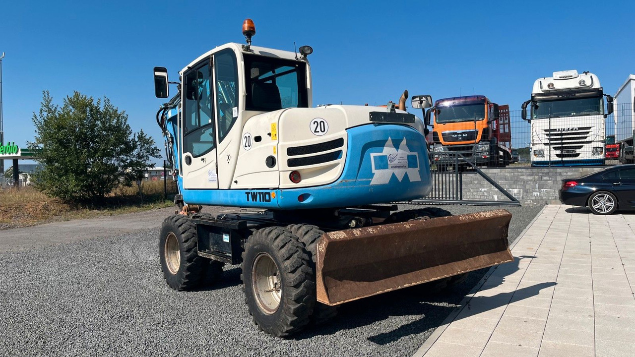 Schaeff TeRex TW110 Mobilbagger Verstellausleger 11000Kg - Bager na kotačima: slika Schaeff TeRex TW110 Mobilbagger Verstellausleger 11000Kg - Bager na kotačima Schaeff TeRex TW110 Mobilbagger Verstellausleger 11000Kg - Bager na kotačima: slika Schaeff TeRex TW110 Mobilbagger Verstellausleger 11000Kg - Bager na kotačima